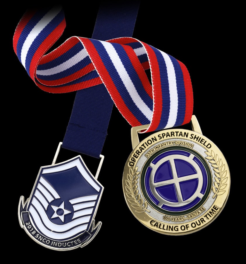 two examples of custom medals on colorful ribbons