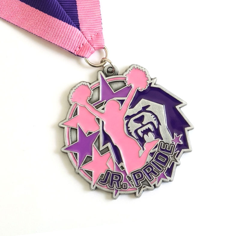 Custom Jr. Pride cheer medal with pink and purple enamel cheerleader silhouette, pom-poms, stars, and bulldog mascot on pink and purple ribbon