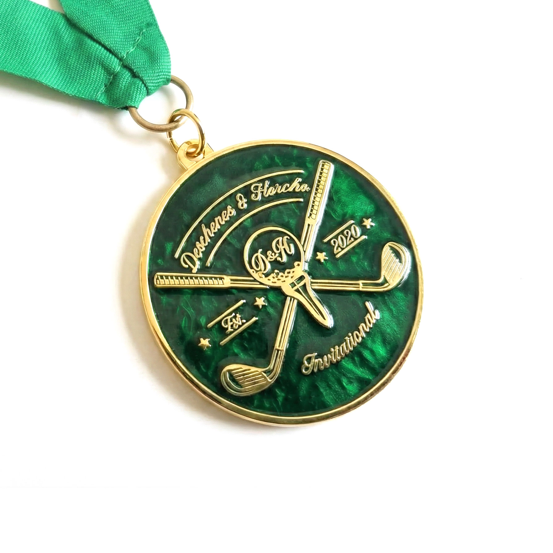 Gold Deschenes and Florcha Invitational golf medal with crossed clubs, green pearl enamel fill, and green satin ribbon