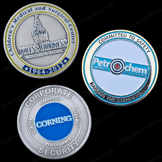 three examples of corporate challenge coins with custom designs